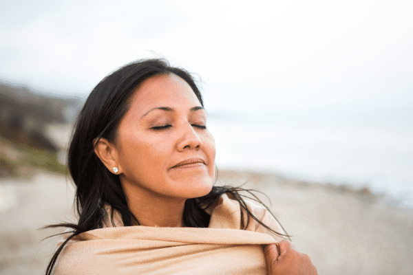 woman relaxing by the beach