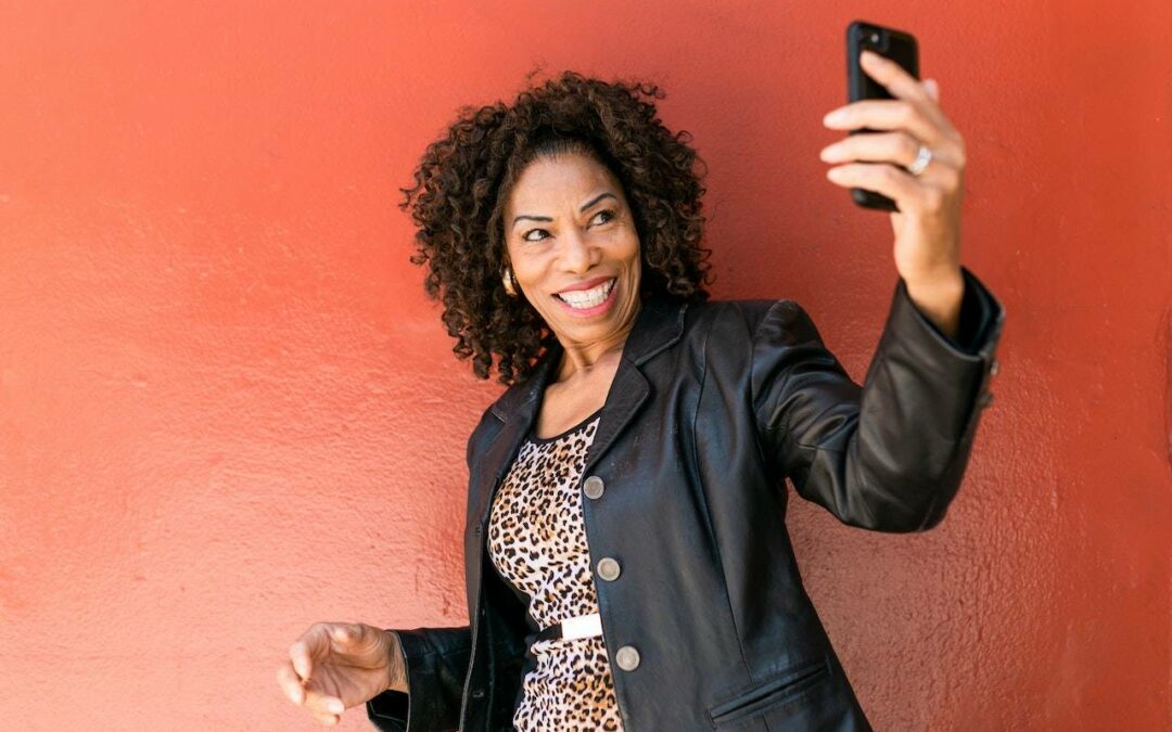 older woman taking a selfie