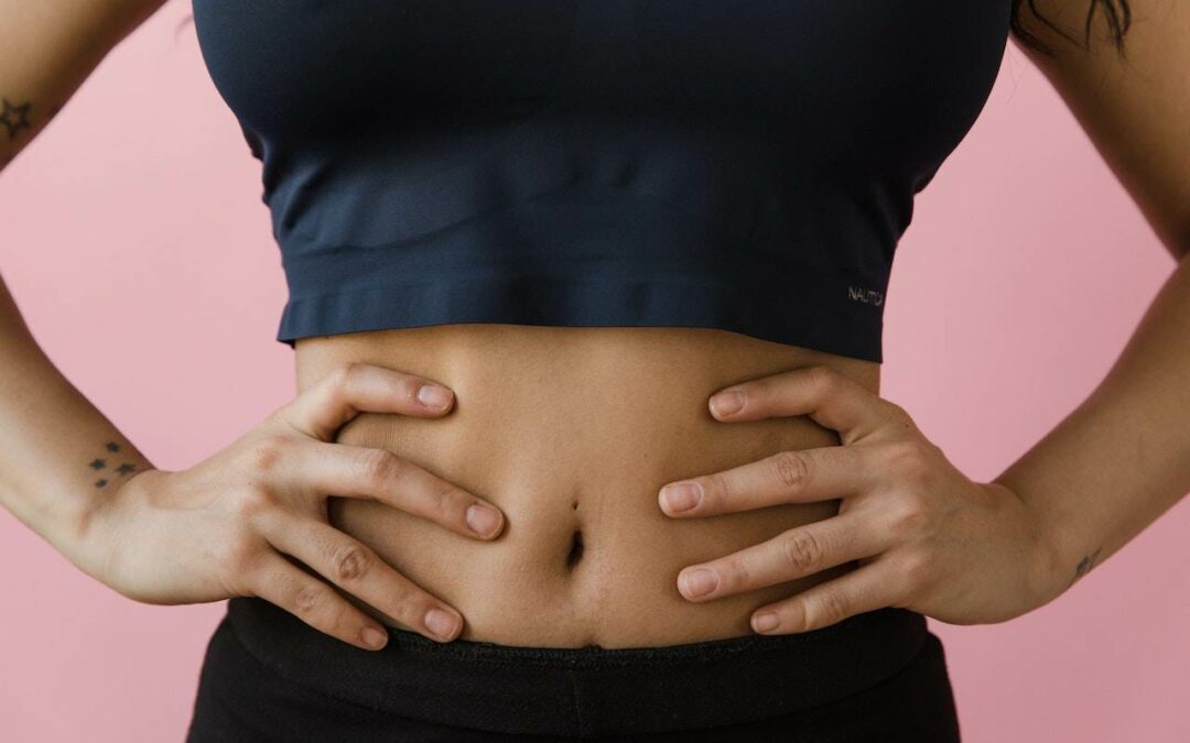 woman hands on her belly