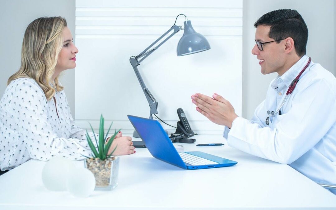 woman talking to a doctor